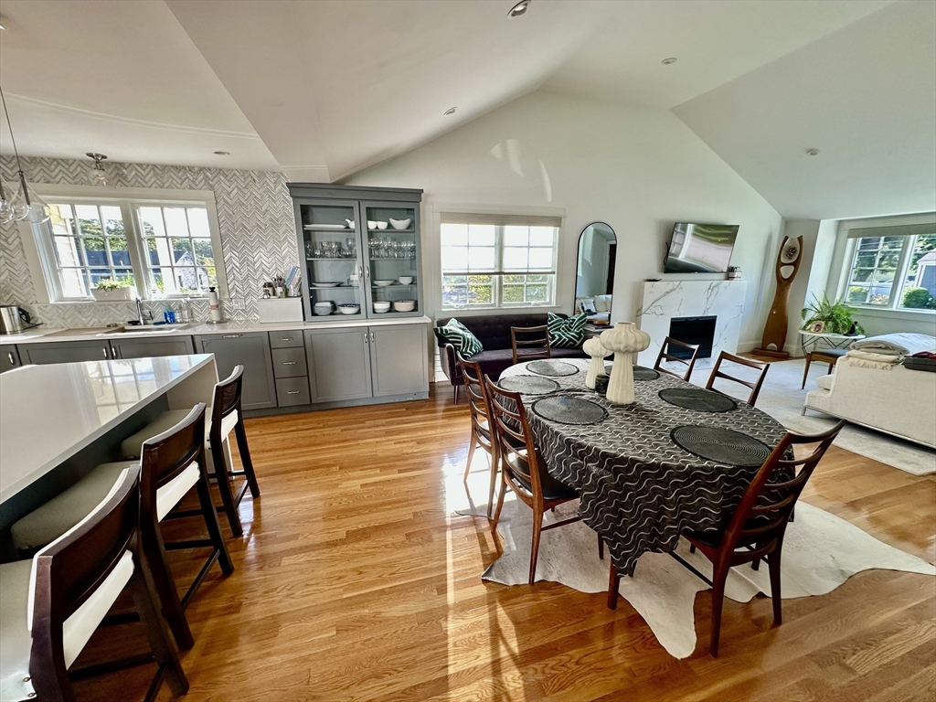 3 Day Circle Woburn, MA 01801 - Photo 2 of 42 a view of a dining room with furniture and wooden floor