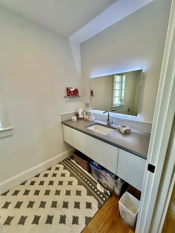 3 Day Circle Woburn, MA 01801 - Photo 30 of 42 a bathroom with a sink and a mirror