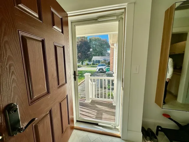 a view of a porch with a door