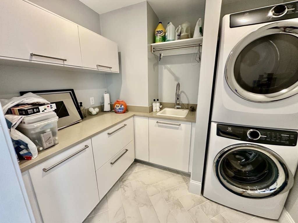 3 Day Circle Woburn, MA 01801 - Photo 33 of 42 a utility room with sink dryer and washer