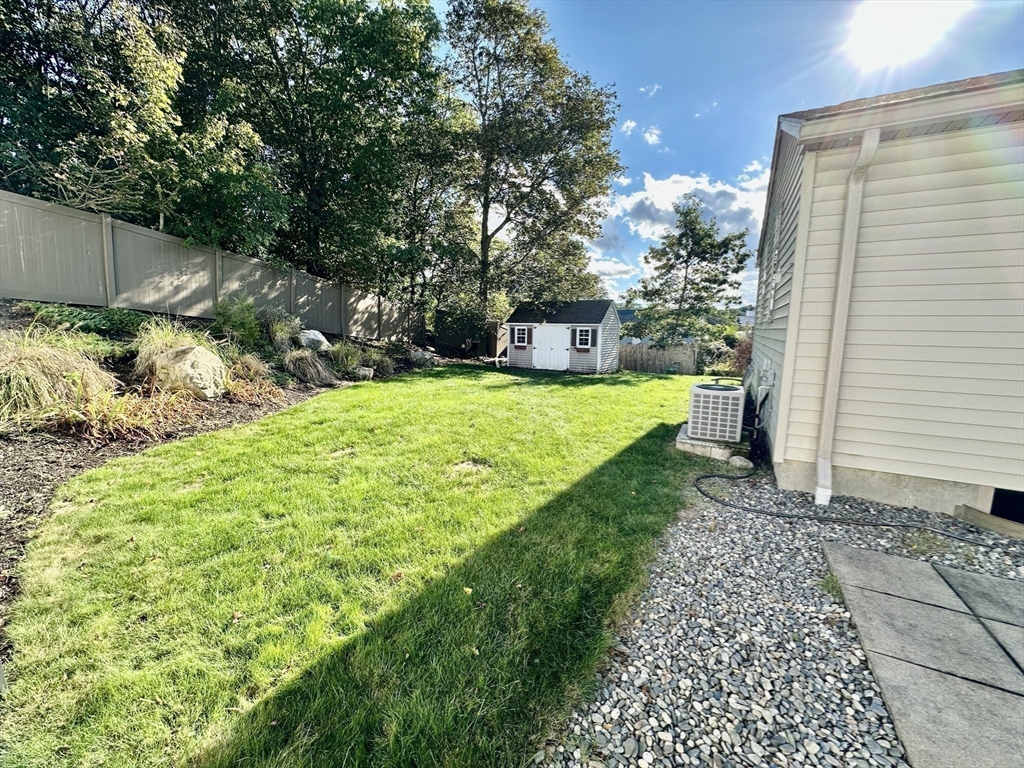 3 Day Circle Woburn, MA 01801 - Photo 38 of 42 a view of a backyard with small cabin