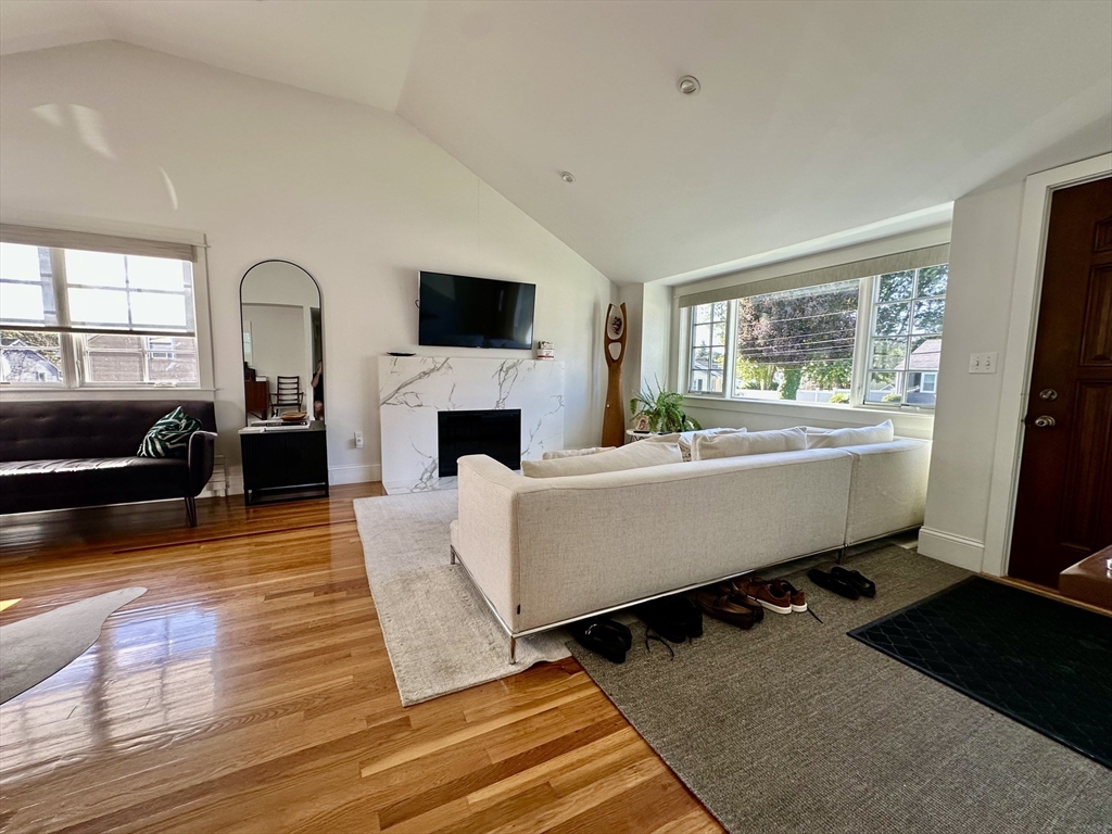 3 Day Circle Woburn, MA 01801 - Photo 4 of 42 a living room with furniture and a flat screen tv