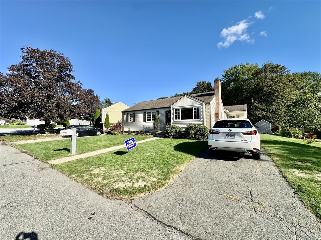 3 Day Circle Woburn, MA 01801 - Photo 42 of 42 a front view of a house with a yard