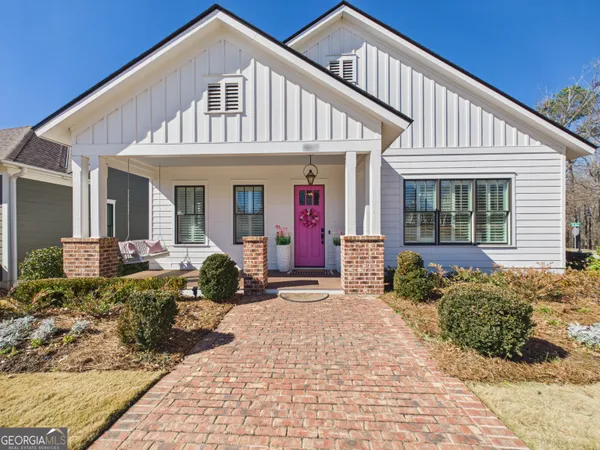 a front view of a house with entertaining space