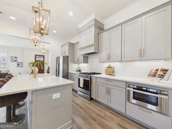 a view of kitchen center island and living room