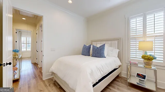 a bathroom with a sink mirror and vanity