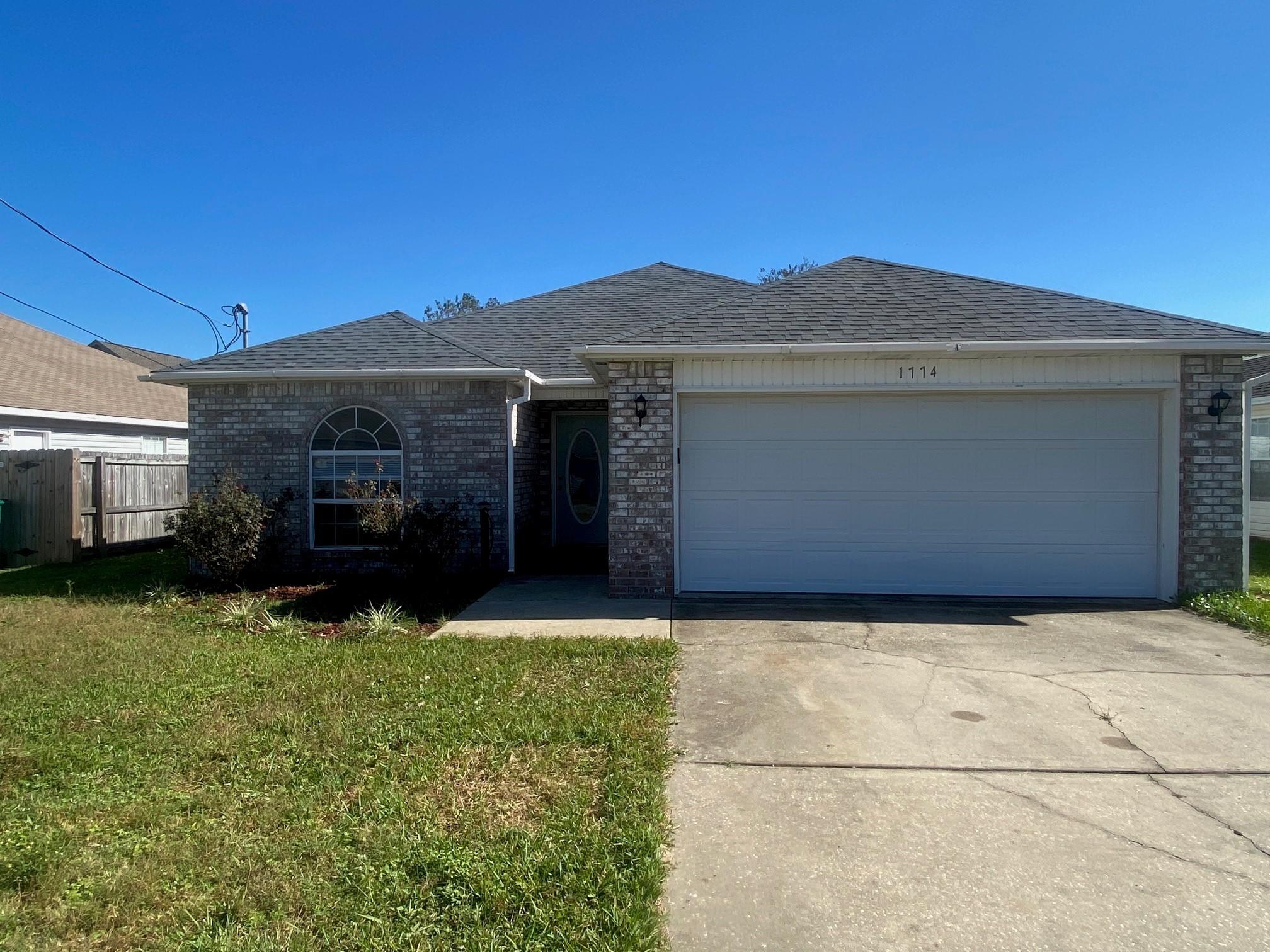 1774 Old Ranch Road Fort Walton Beach, FL 32547 - Photo 1 of 47 a front view of a house with yard