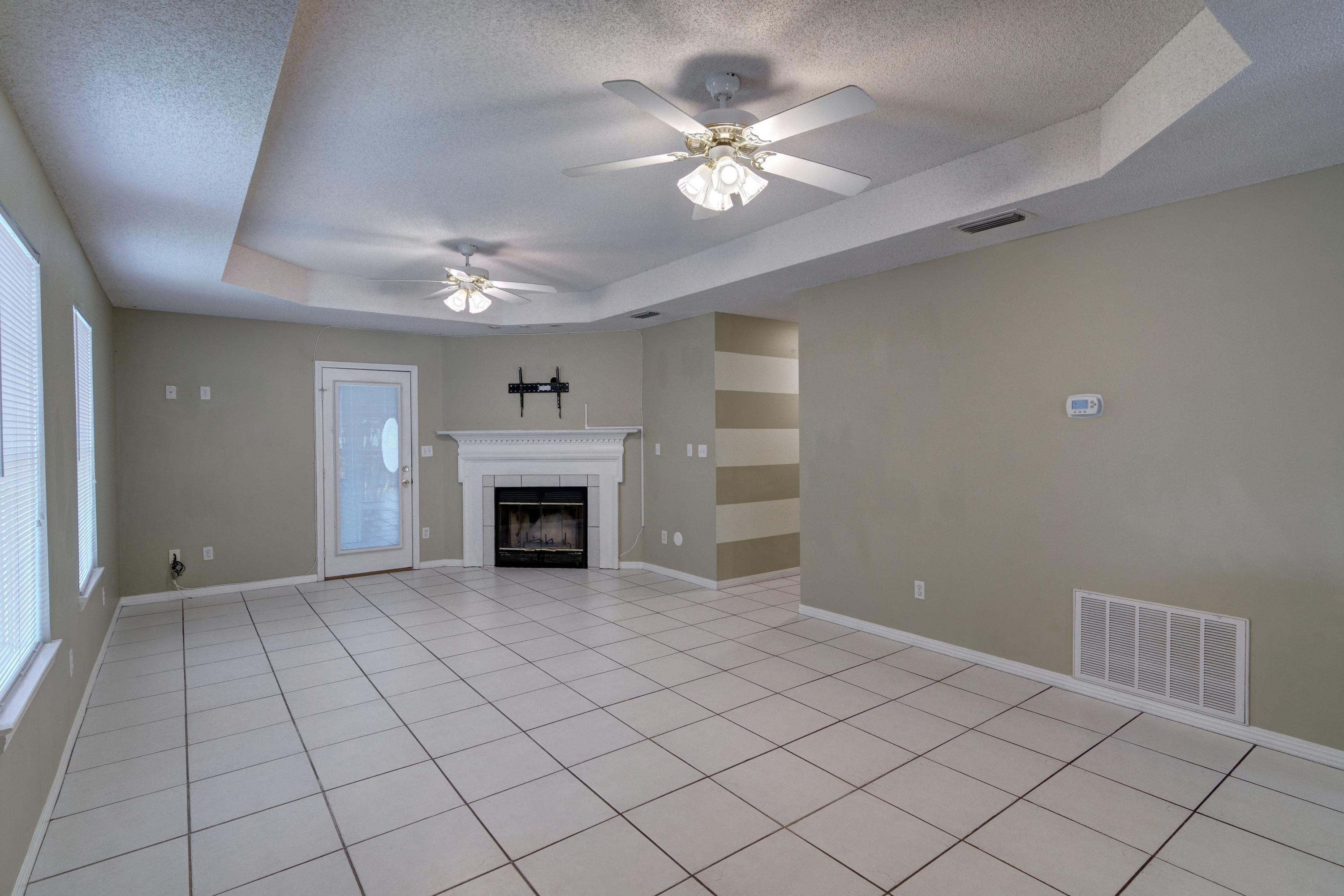 1774 Old Ranch Road Fort Walton Beach, FL 32547 - Photo 17 of 47 a view of an empty room with a fireplace