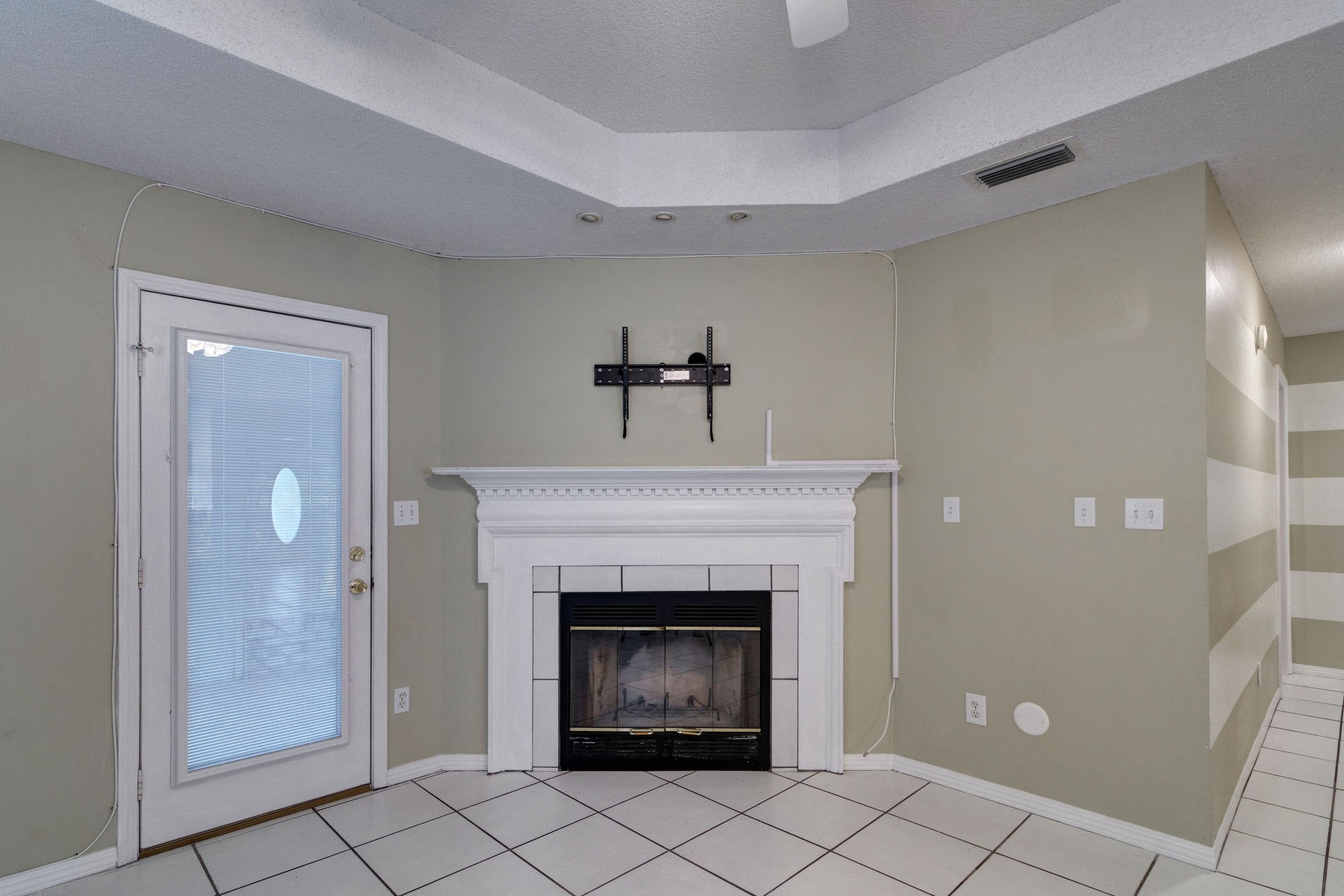 1774 Old Ranch Road Fort Walton Beach, FL 32547 - Photo 20 of 47 a view of an empty room with a fireplace