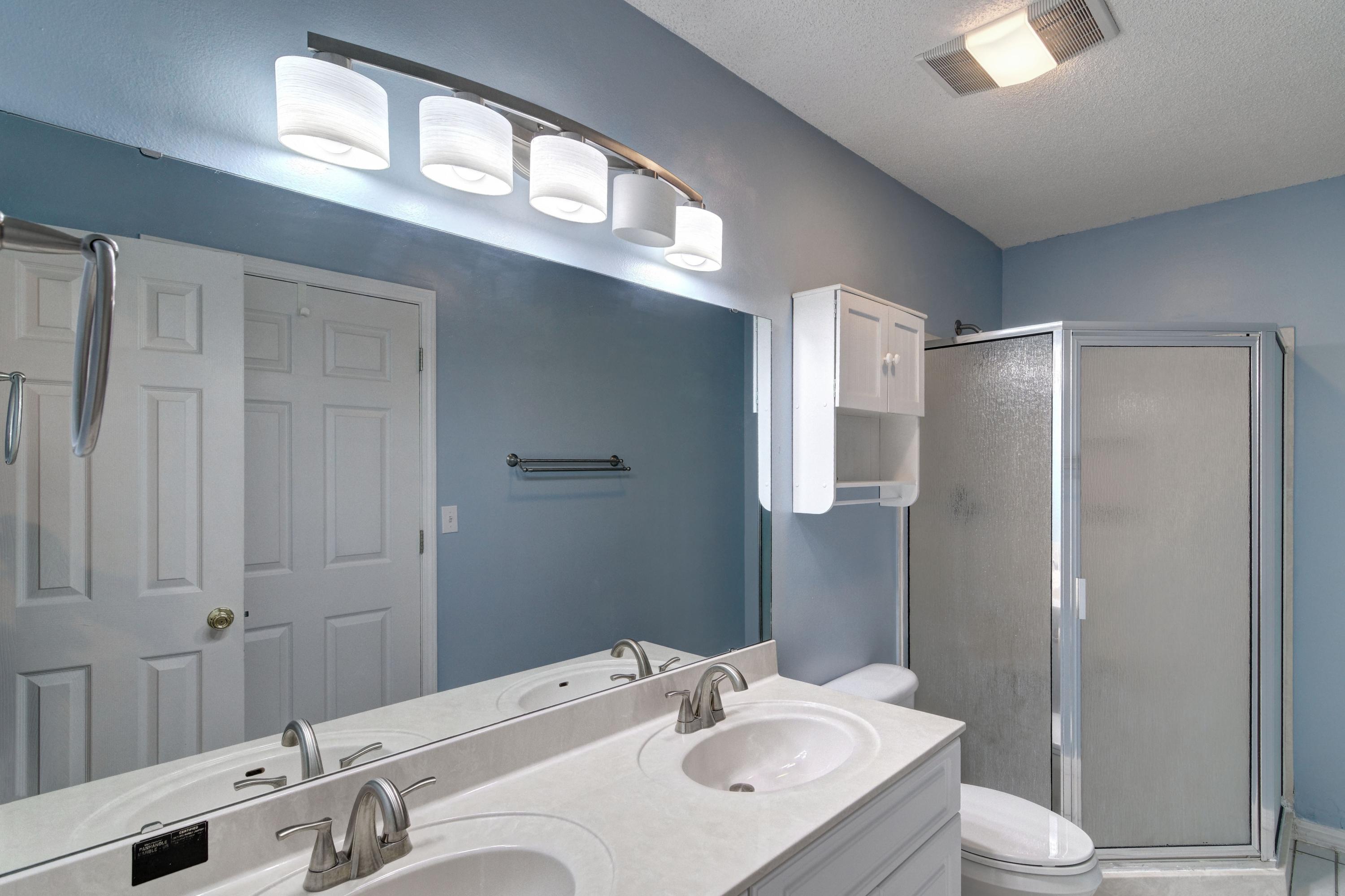 1774 Old Ranch Road Fort Walton Beach, FL 32547 - Photo 26 of 47 a bathroom with a granite countertop sink toilet and shower