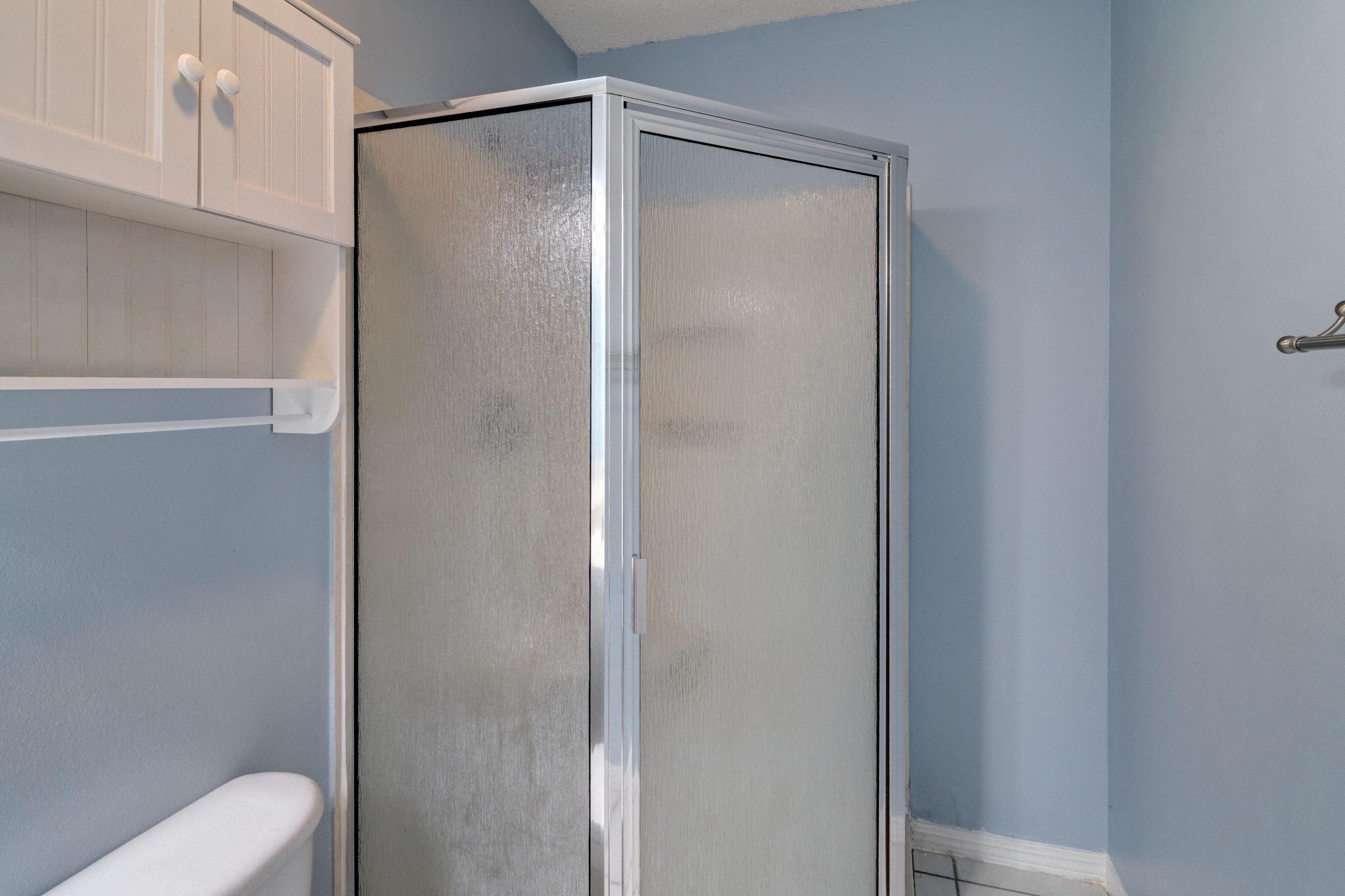 1774 Old Ranch Road Fort Walton Beach, FL 32547 - Photo 28 of 47 a bathroom with a glass shower door