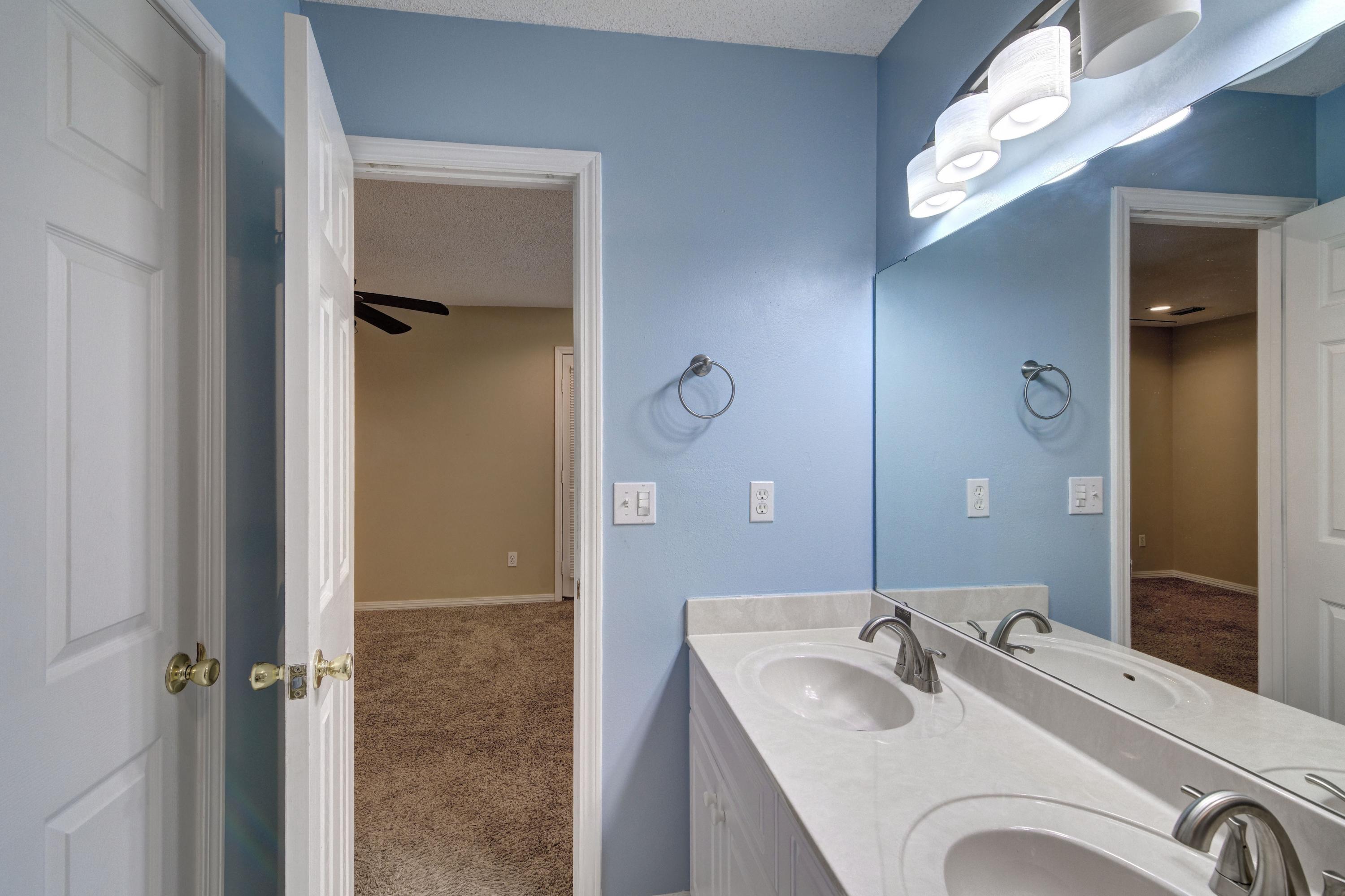 1774 Old Ranch Road Fort Walton Beach, FL 32547 - Photo 29 of 47 a bathroom with a sink and a mirror