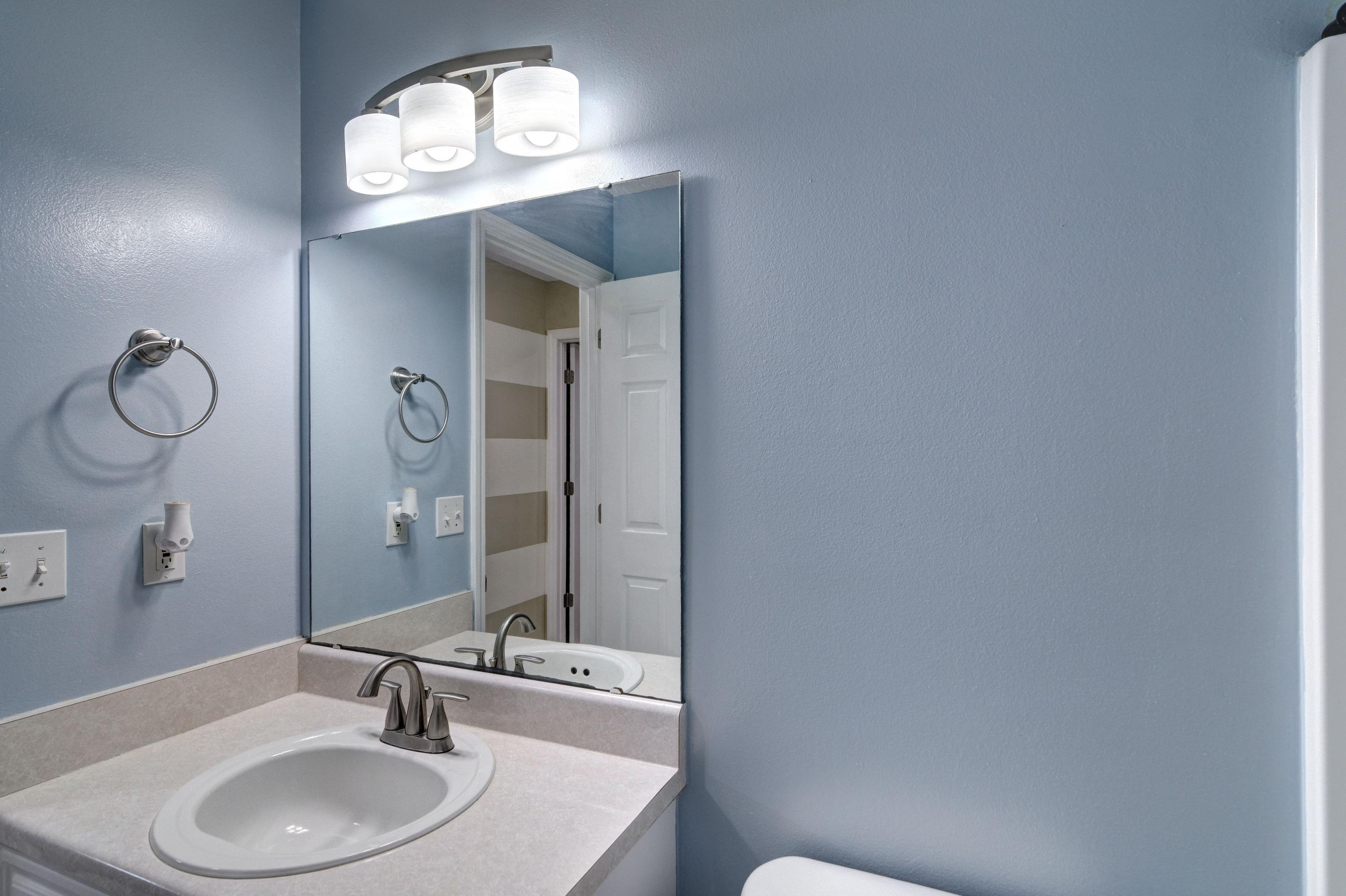 1774 Old Ranch Road Fort Walton Beach, FL 32547 - Photo 34 of 47 a bathroom with a toilet sink and mirror