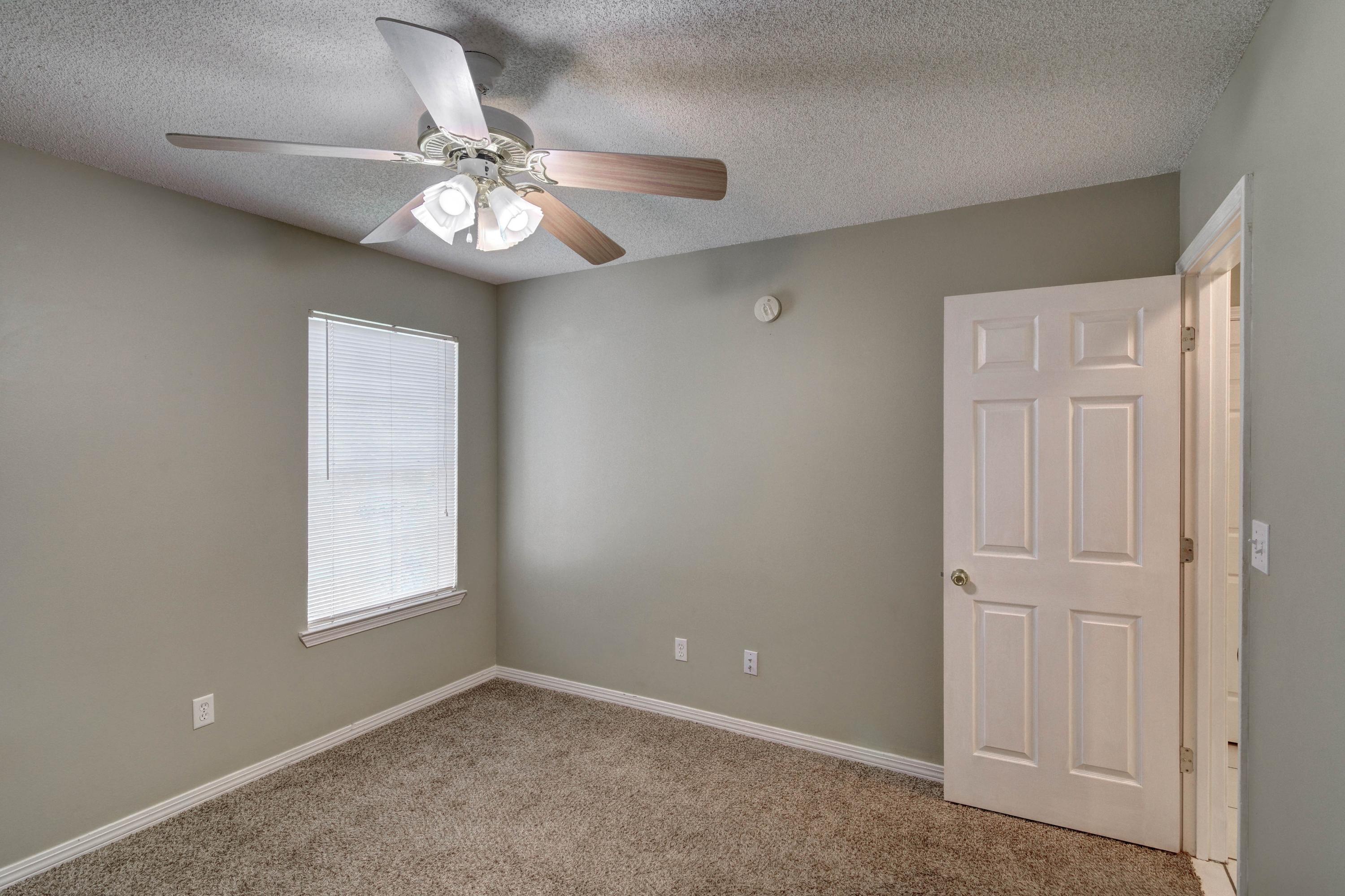 1774 Old Ranch Road Fort Walton Beach, FL 32547 - Photo 36 of 47 an empty room with windows and fan