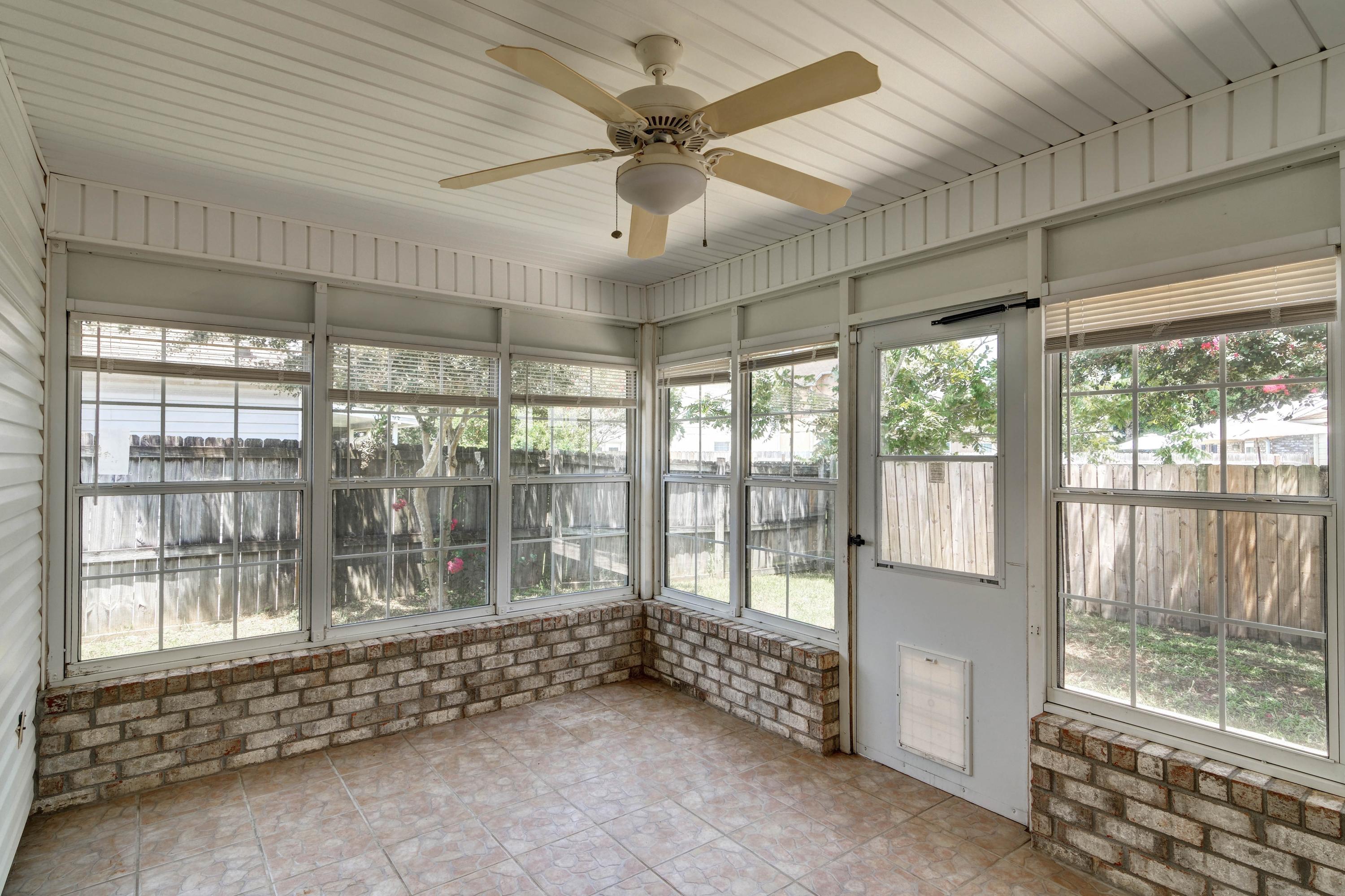 1774 Old Ranch Road Fort Walton Beach, FL 32547 - Photo 40 of 47 a living room with a large window