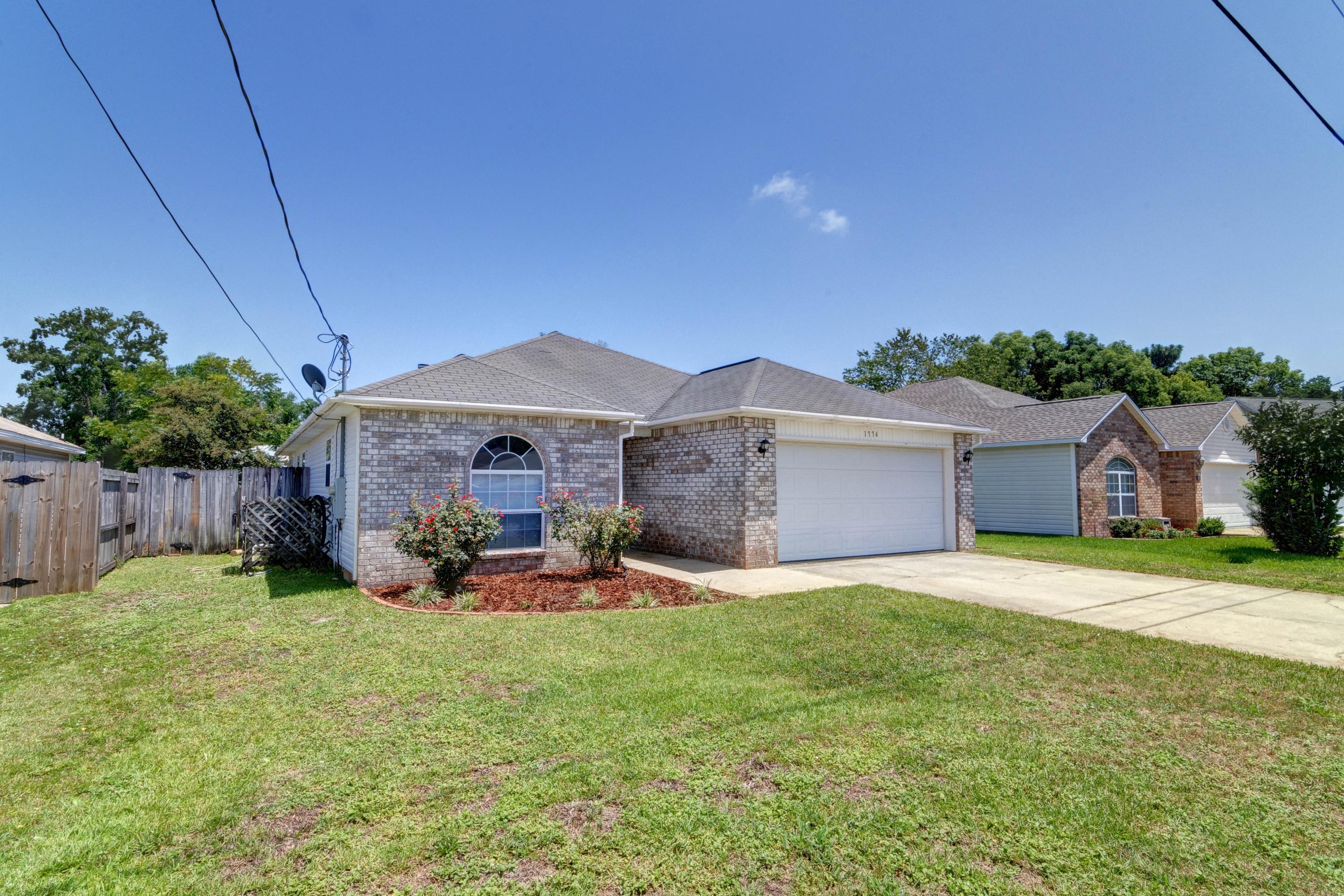 1774 Old Ranch Road Fort Walton Beach, FL 32547 - Photo 47 of 47 a view of a house with a yard and sitting area