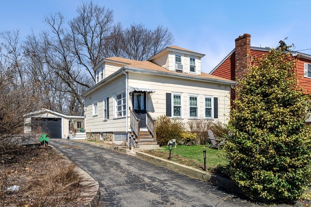 222 Windsor Avenue Swampscott, MA 01907 - Photo 1 of 36 a front view of a house with garden