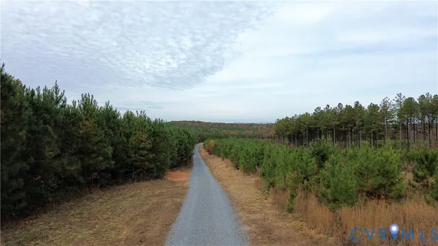 a view of a lake with a yard