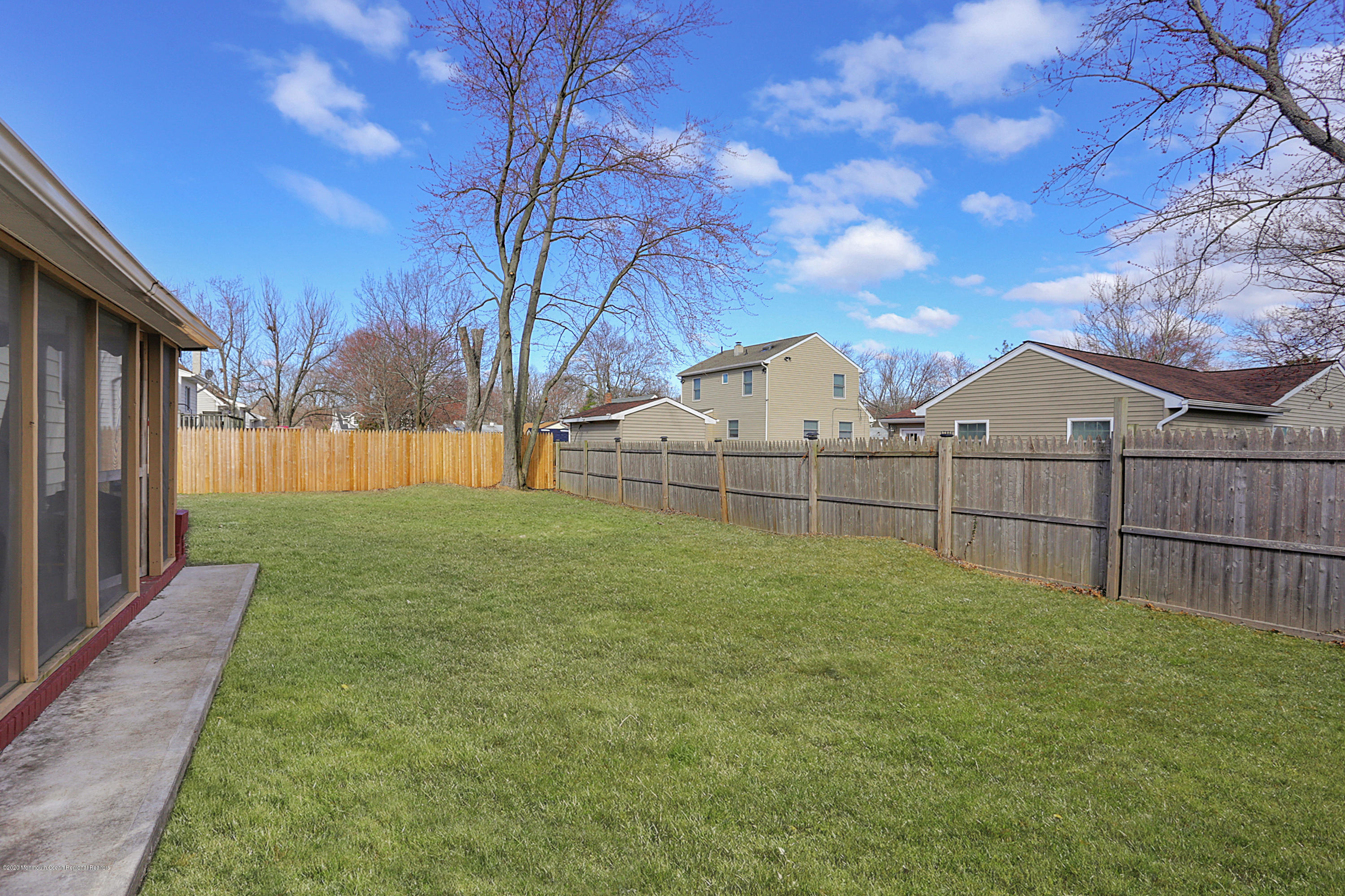 271 Middle Road Hazlet, NJ 07730 - Photo 10 of 11 a view of backyard with wooden fence