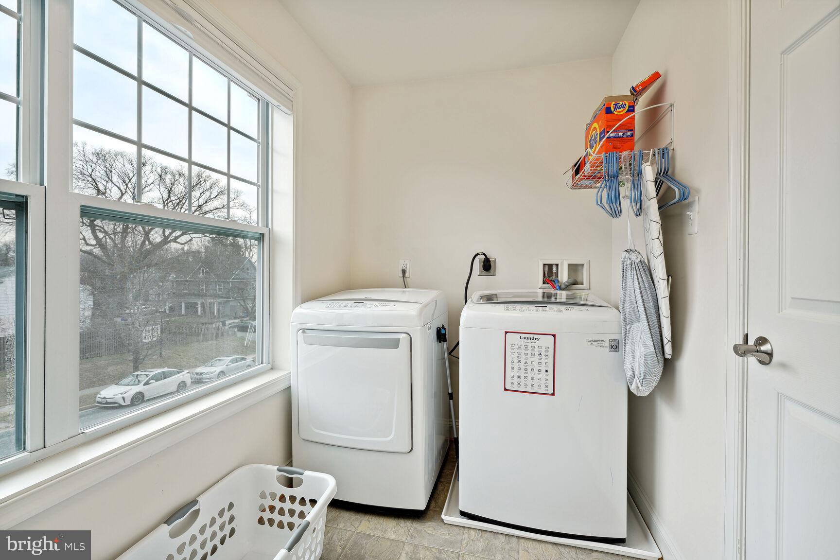 1907 Kermit Road Silver Spring, MD 20910 - Photo 16 of 20 a utility room with dryer and washer