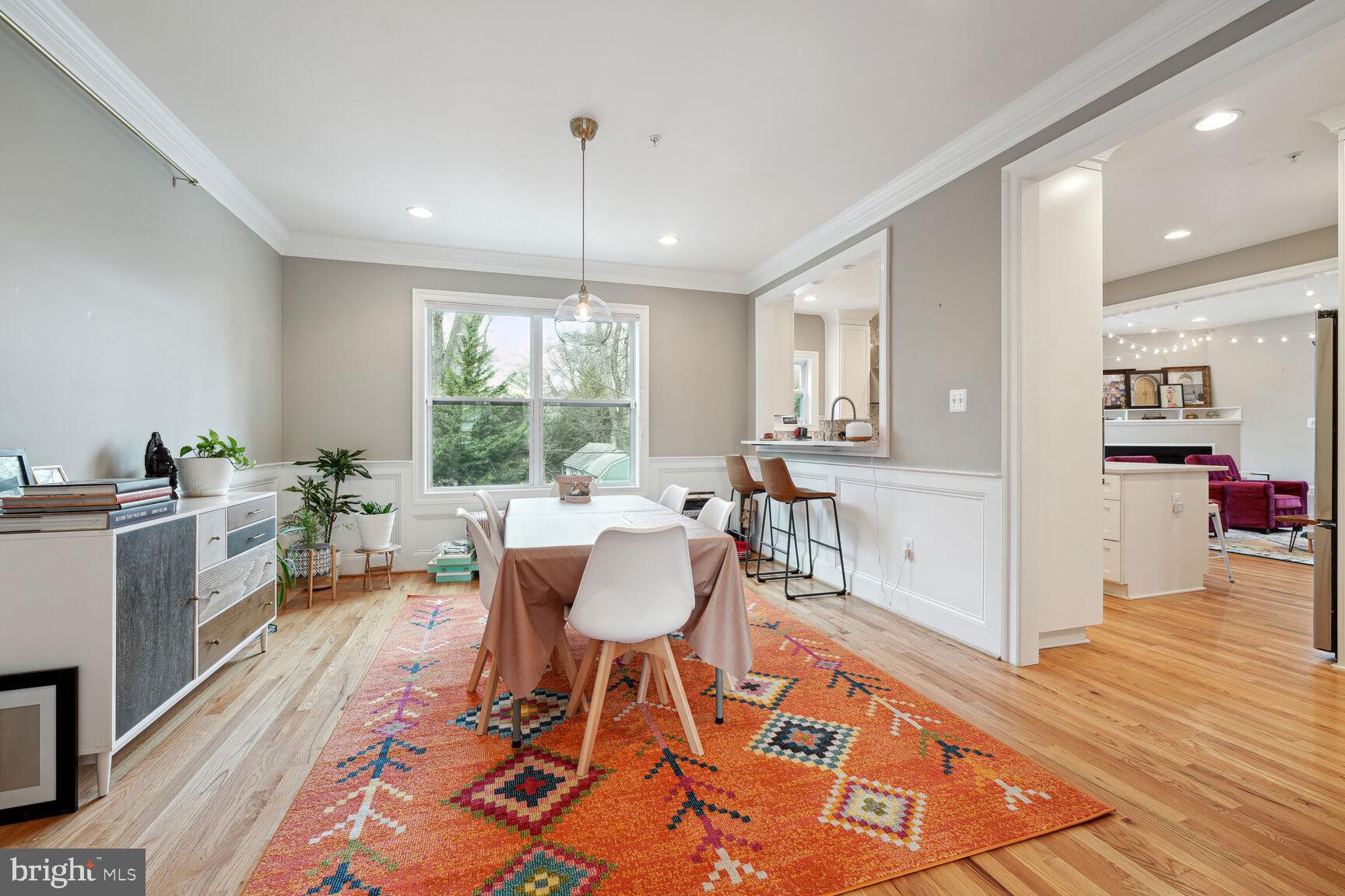 1907 Kermit Road Silver Spring, MD 20910 - Photo 6 of 20 a view of a dining room with furniture window and wooden floor