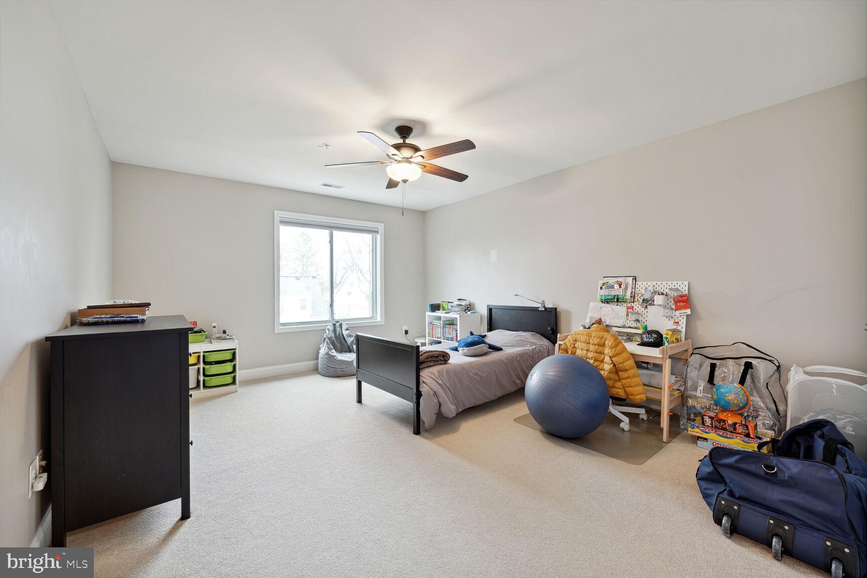 1907 Kermit Road Silver Spring, MD 20910 - Photo 9 of 20 a living room with furniture and a chandelier
