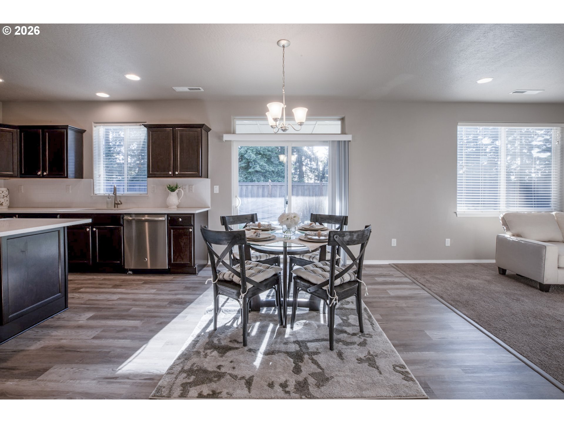 2952 Shelby Way Eugene, OR 97404 - Photo 8 of 25 a view of a dining room with furniture window and outside view