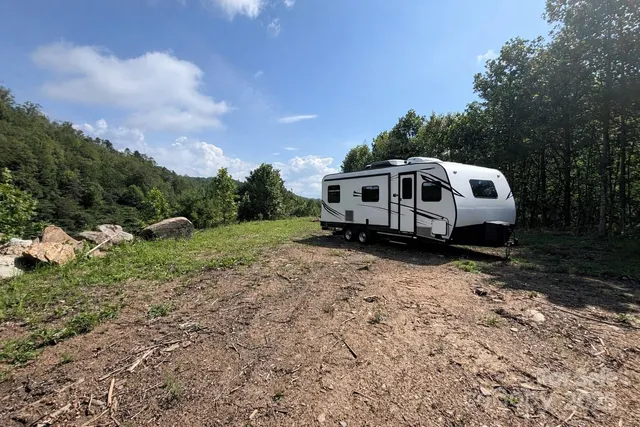 a house view with a backyard space