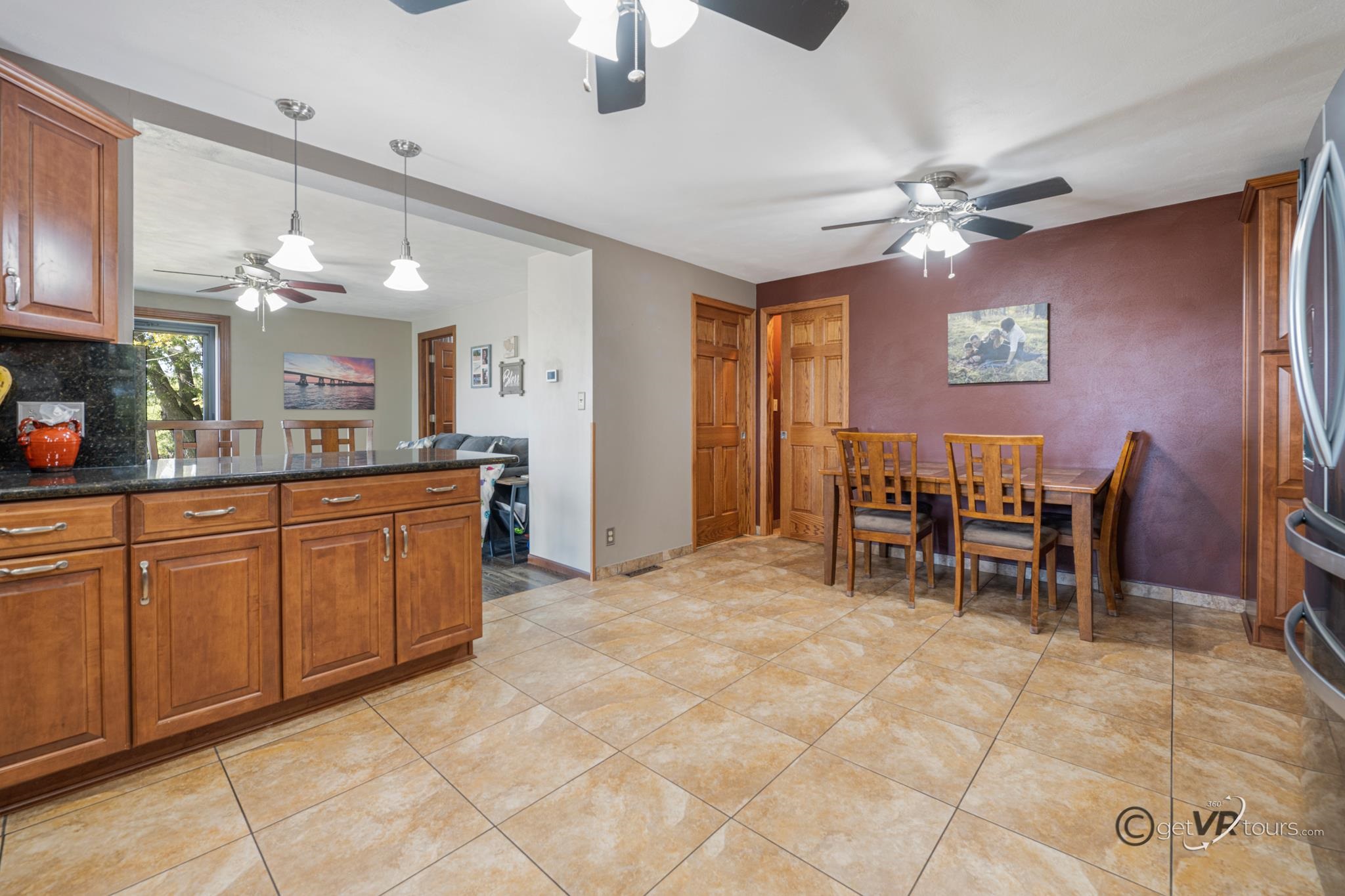 2472 West Red Oak Road Freeport, IL 61032 - Photo 11 of 45 a view of a dining room with furniture and chandelier