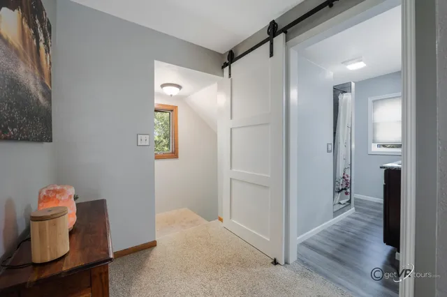 a bathroom with a sink double vanity and a mirror