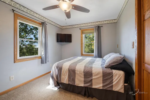 a very nice looking room with a big bed