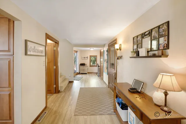 a view of a living room and dining room