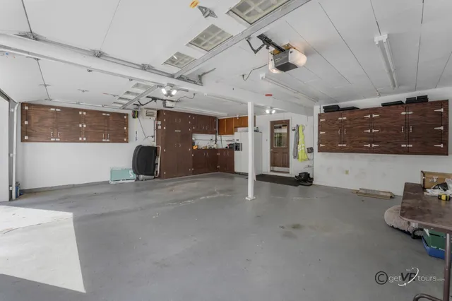 an aerial view of a house with a garden