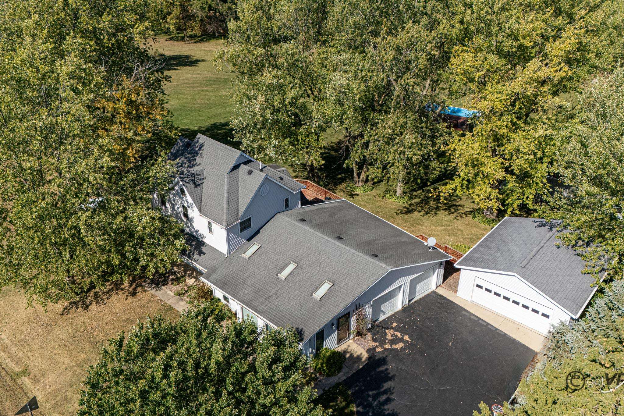 2472 West Red Oak Road Freeport, IL 61032 - Photo 28 of 45 an aerial view of a house with a garden