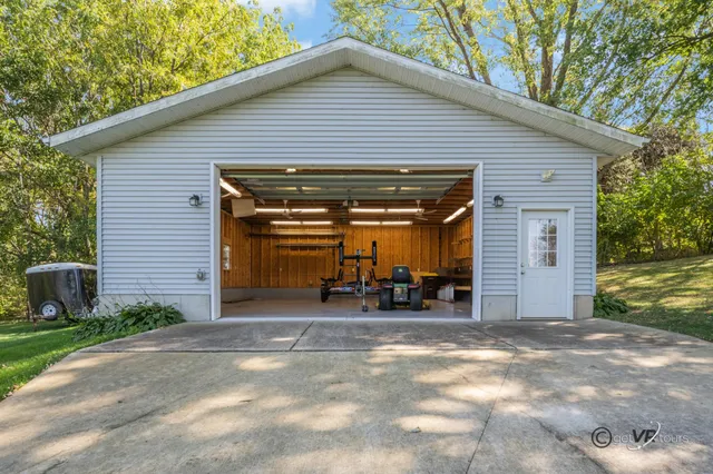 a view of outdoor space with deck and yard