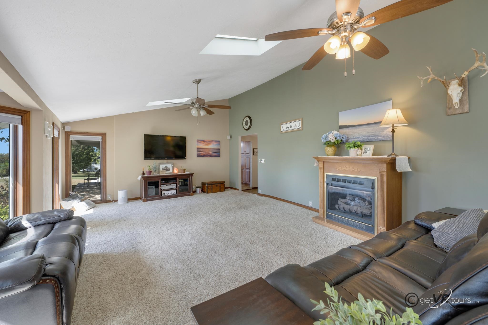 2472 West Red Oak Road Freeport, IL 61032 - Photo 4 of 45 a living room with furniture and a fireplace