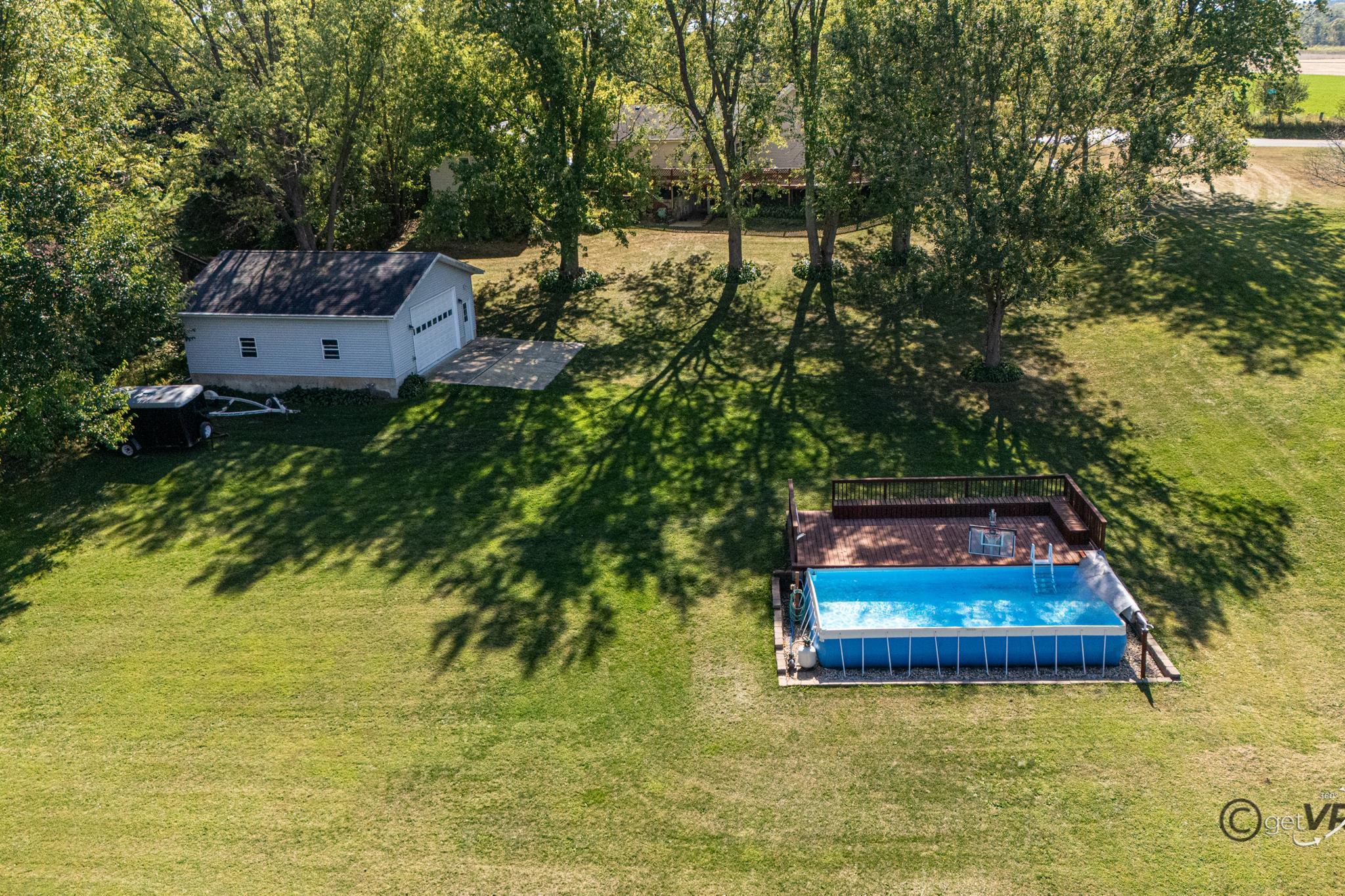 2472 West Red Oak Road Freeport, IL 61032 - Photo 41 of 45 a house with swimming pool
