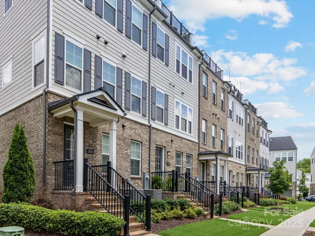 a view of a building with a yard