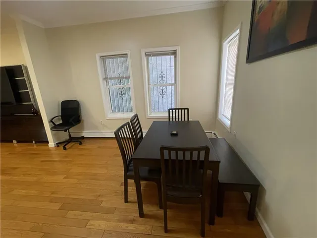 a kitchen with a sink and a stove top oven