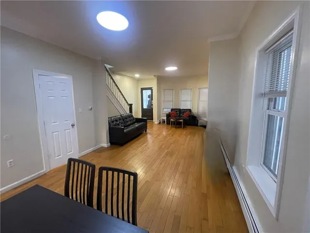 a bed room with a bed and a window