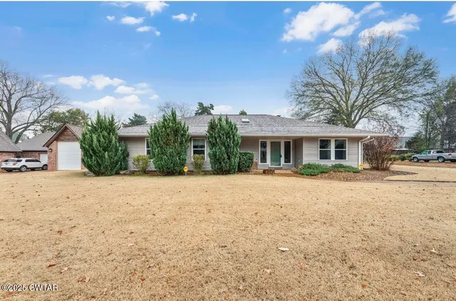 a front view of house with yard