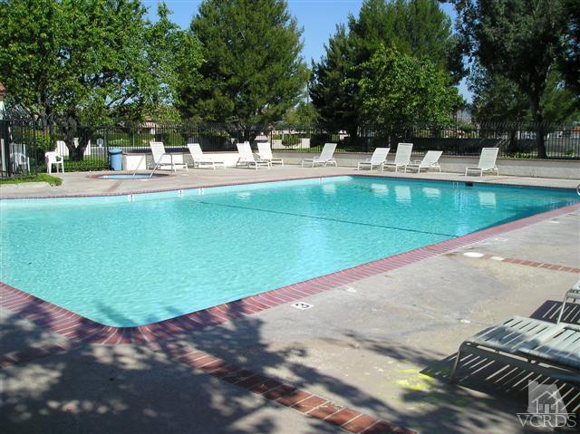 1712 Sinaloa Road, Unit 102 Simi Valley, CA 93065 - Photo 6 of 6 a view of a swimming pool with an outdoor space
