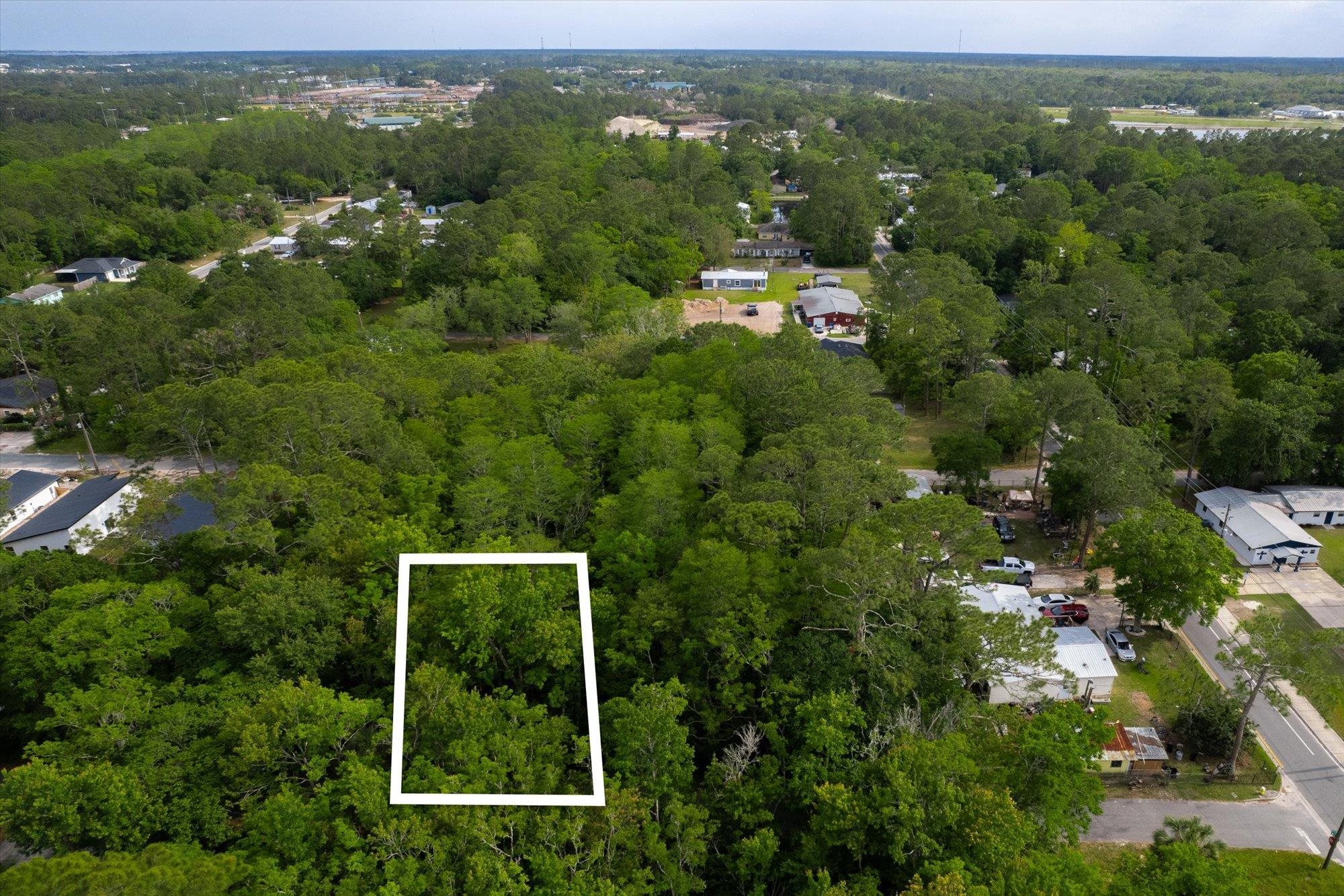 0 West 8th Street St. Augustine, FL 32084 - Photo 4 of 31 an aerial view of residential houses with outdoor space and trees