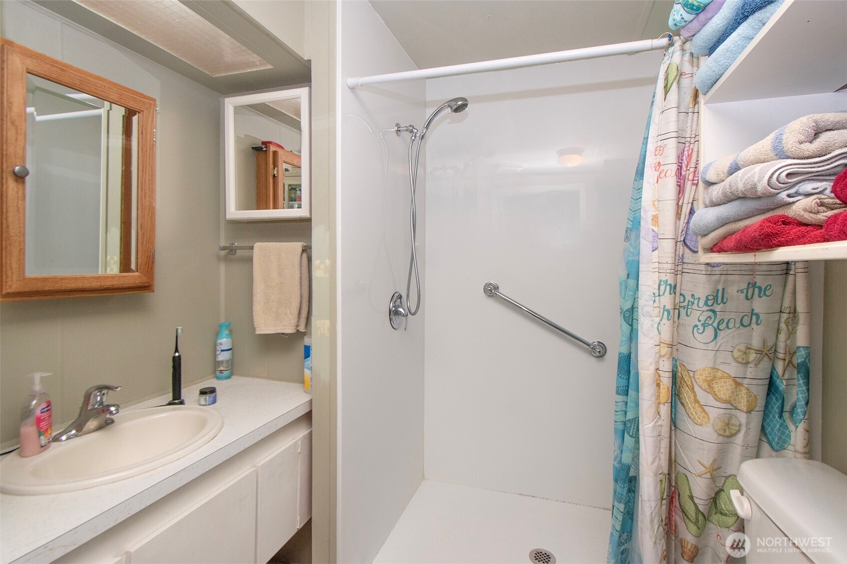 921 South 3rd Avenue, Unit 7 Sequim, WA 98382 - Photo 11 of 32 a bathroom with a sink toilet and shower