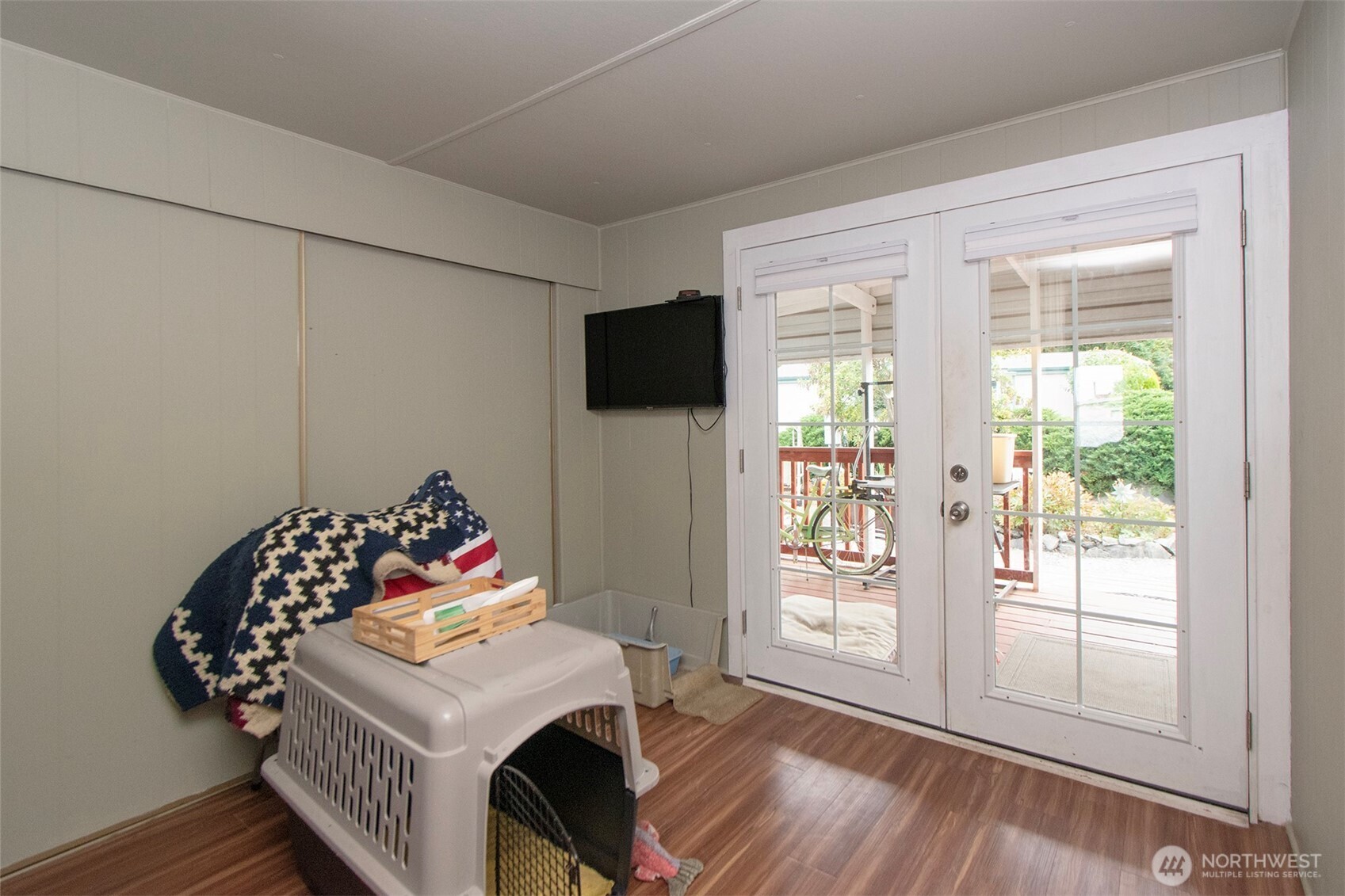 921 South 3rd Avenue, Unit 7 Sequim, WA 98382 - Photo 16 of 32 a bedroom with a bed and a window