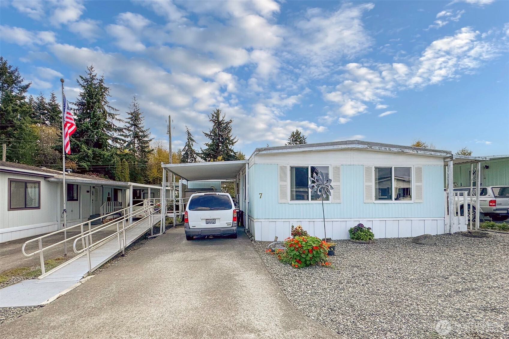 921 South 3rd Avenue, Unit 7 Sequim, WA 98382 - Photo 31 of 32 a front view of house with yard