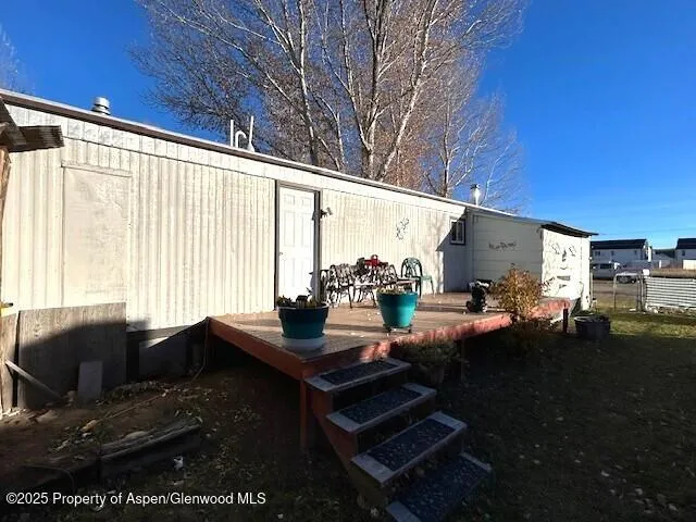 a view of a living room and dining room