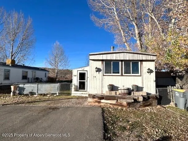a house view with a outdoor space