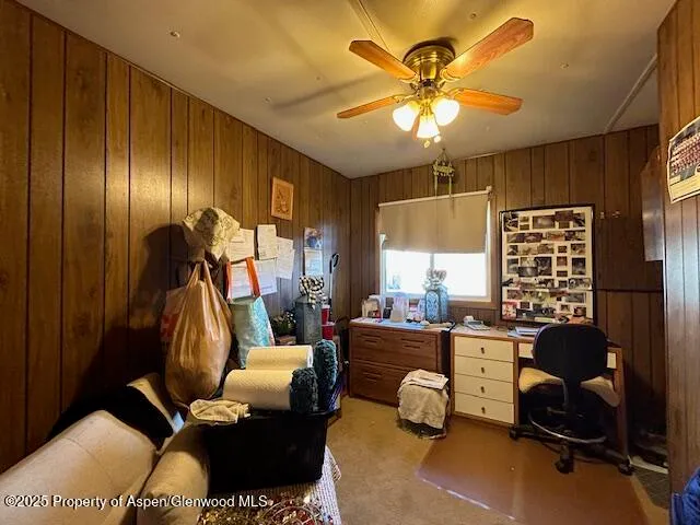 a room with gym equipment and a large window