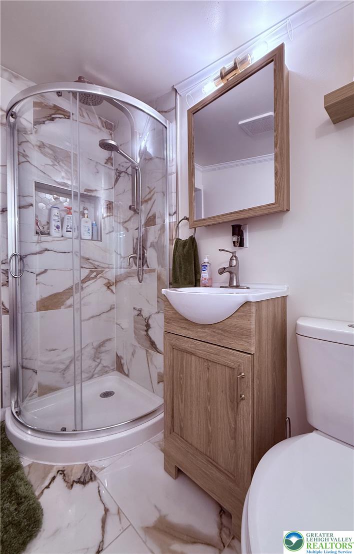 1275 Macada Road Bethlehem, PA 18017 - Photo 43 of 87 a bathroom with a sink a toilet and shower
